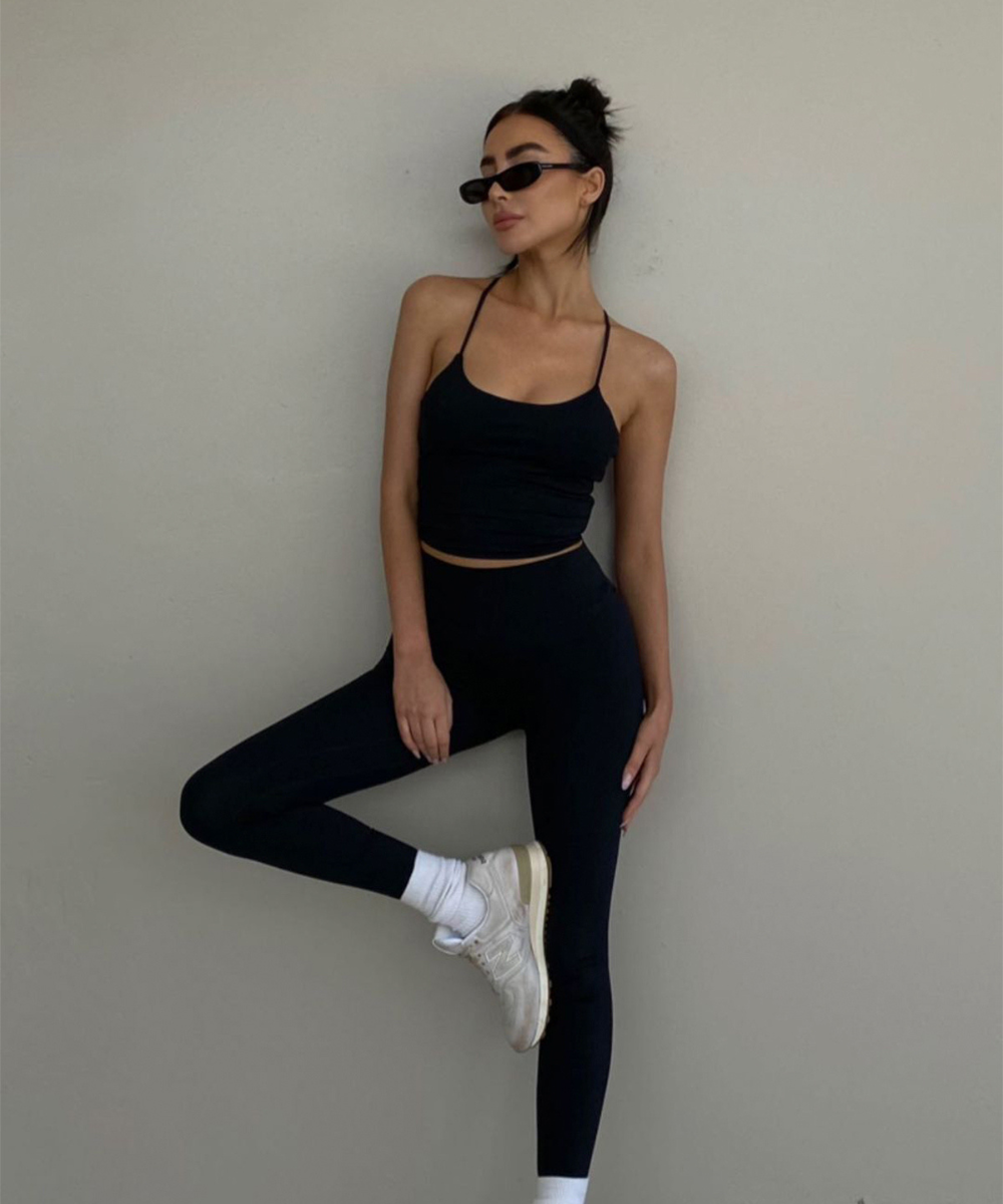 Model in CSB black athleisure